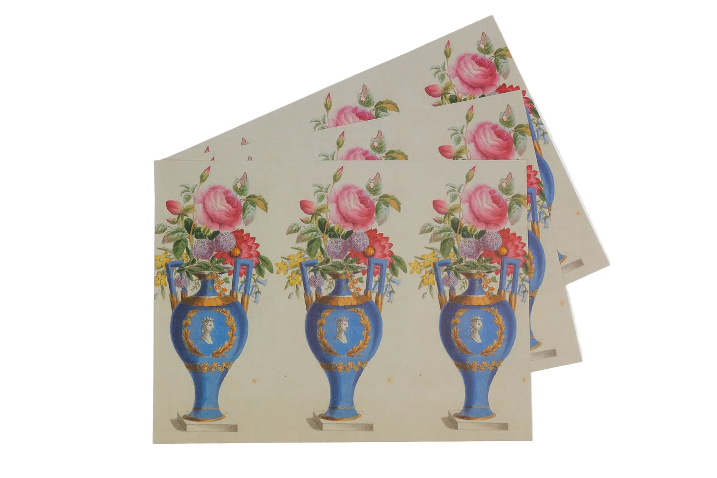 Three sheets of paper with floral and vase design on a white background