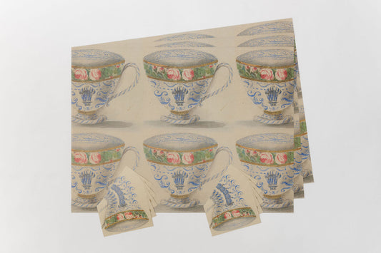 Pack of gift wrap and postcardswith floral and teacup design on a white background