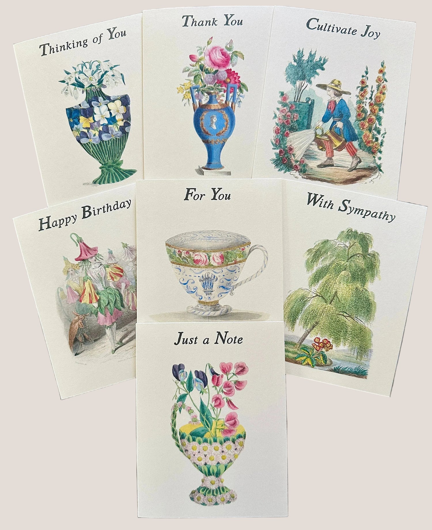 Seven vintage-inspired greeting cards from Caldwell's Miscellaneous Fancy Goods, featuring antique floral illustrations including a rose filled cameo urn, a teacup, a weeping willow, and garden scenes, for occasions from Thank You to With Sympathy.
